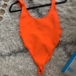 Neon Orange body suit